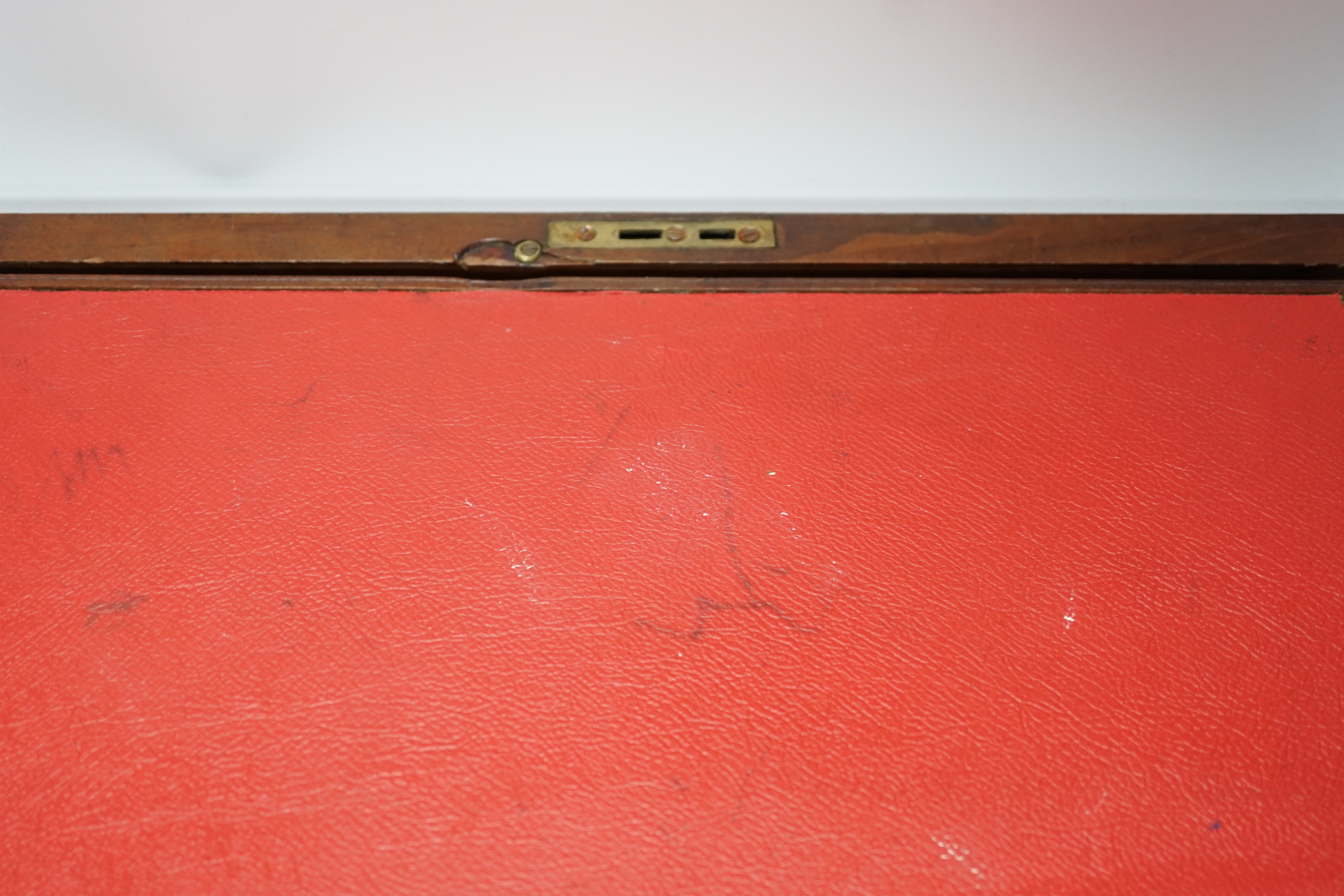 A Georgian writing slope with brass lock plate, 46cm